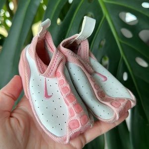 Pink slip on infant Nike shoes